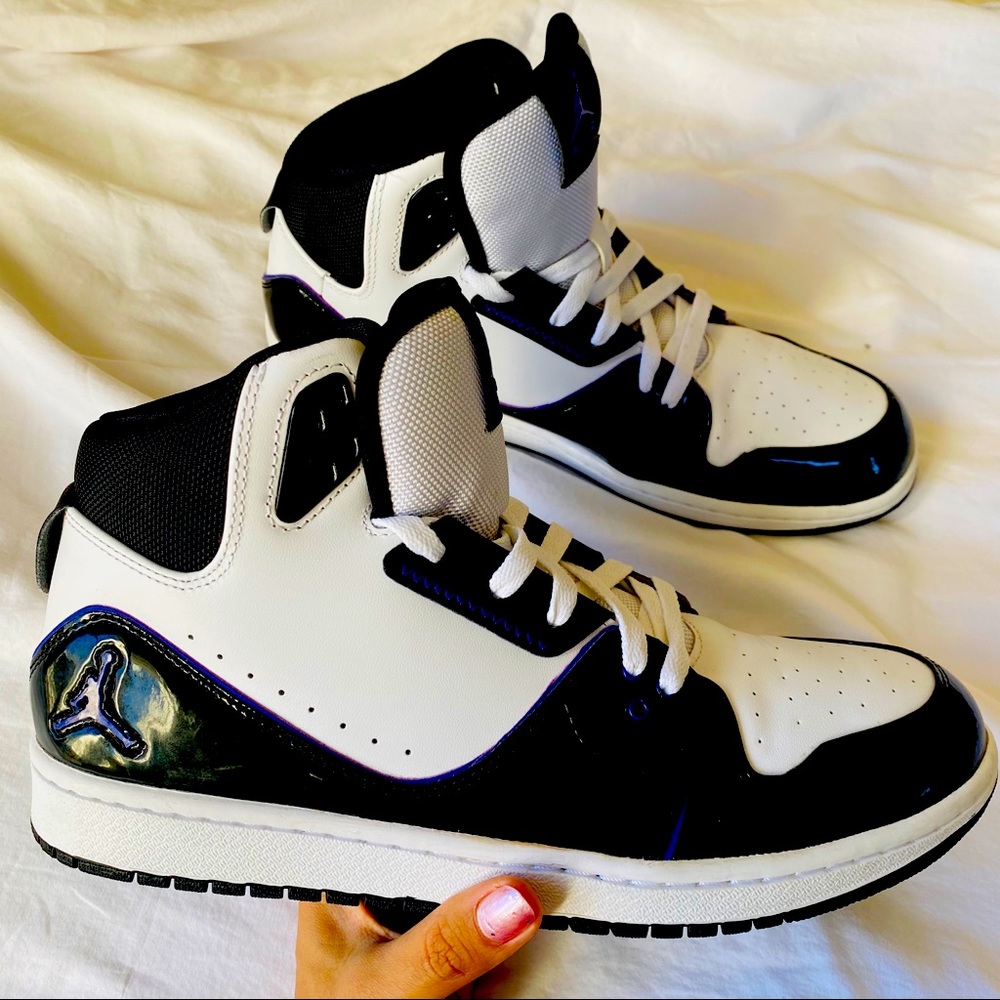 Nike Air Jordan Black and Purple High Top sneakers
